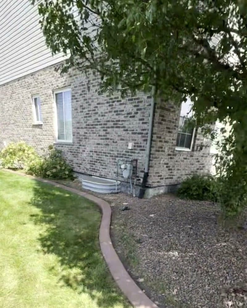 Concrete curbing: along the house