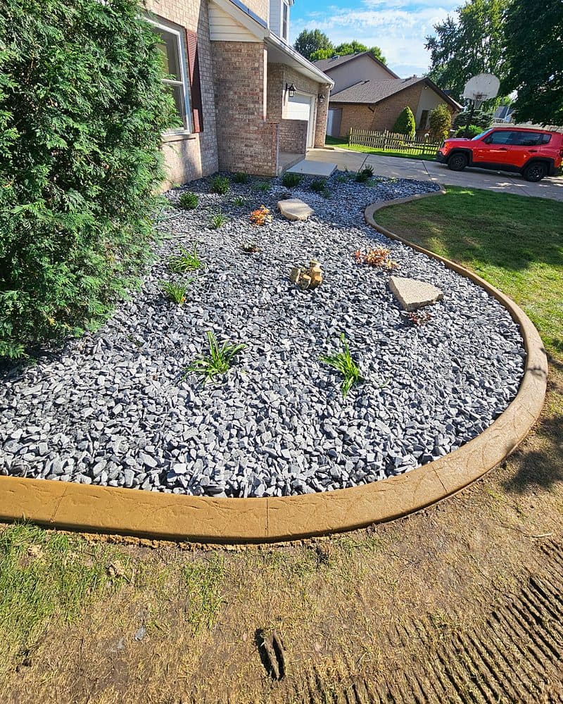 Concrete curbing: front beds