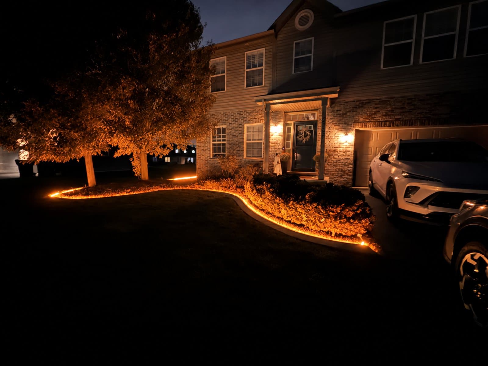 Concrete curb lit orange at night