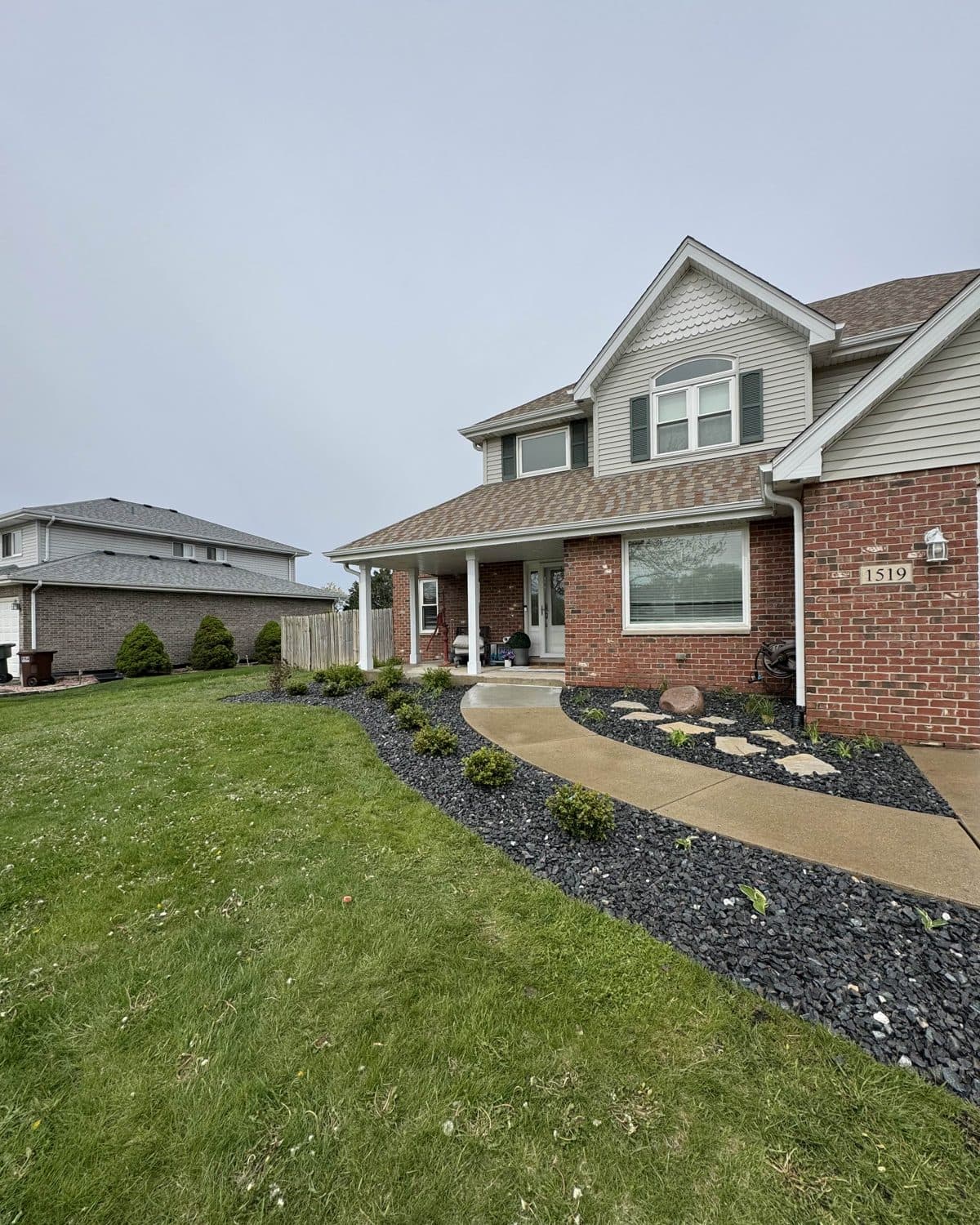 Clean beds along a front walk